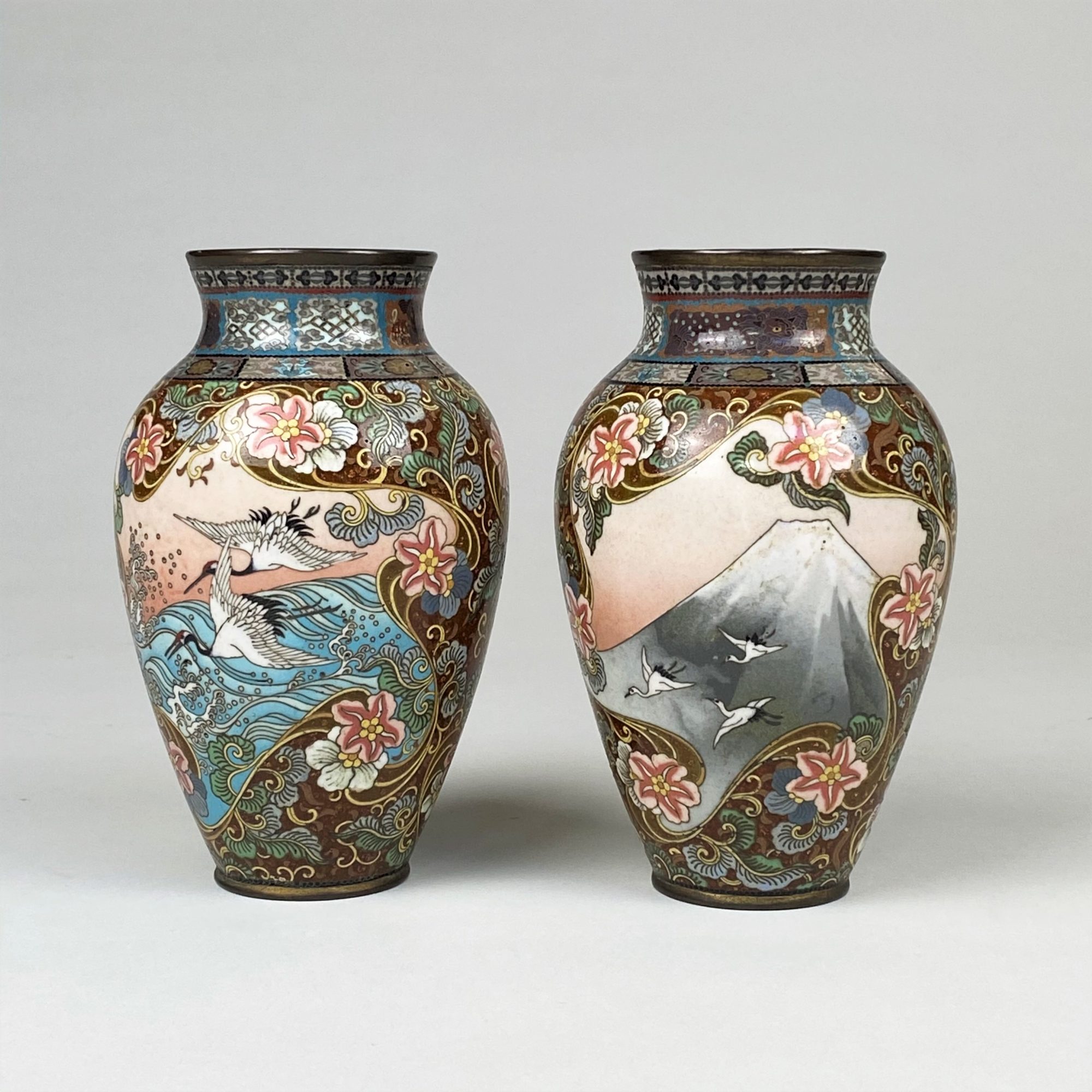 A small, yet dramatic pair of late 19th Century Japanese cloisonne