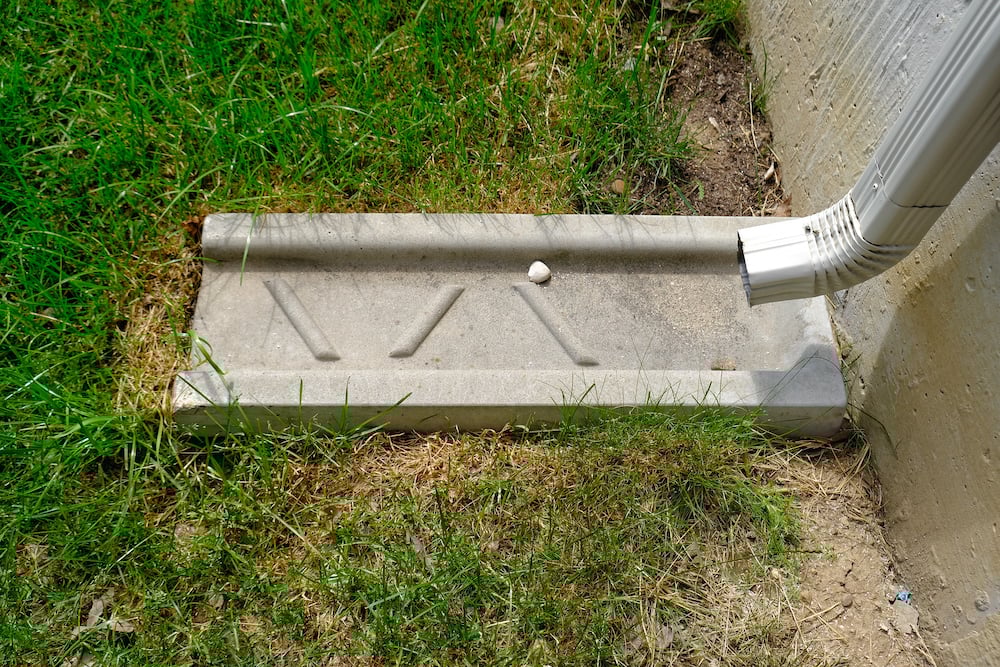 Do Gutter Downspouts Need Splash Blocks? KGuard Rocky Mountains