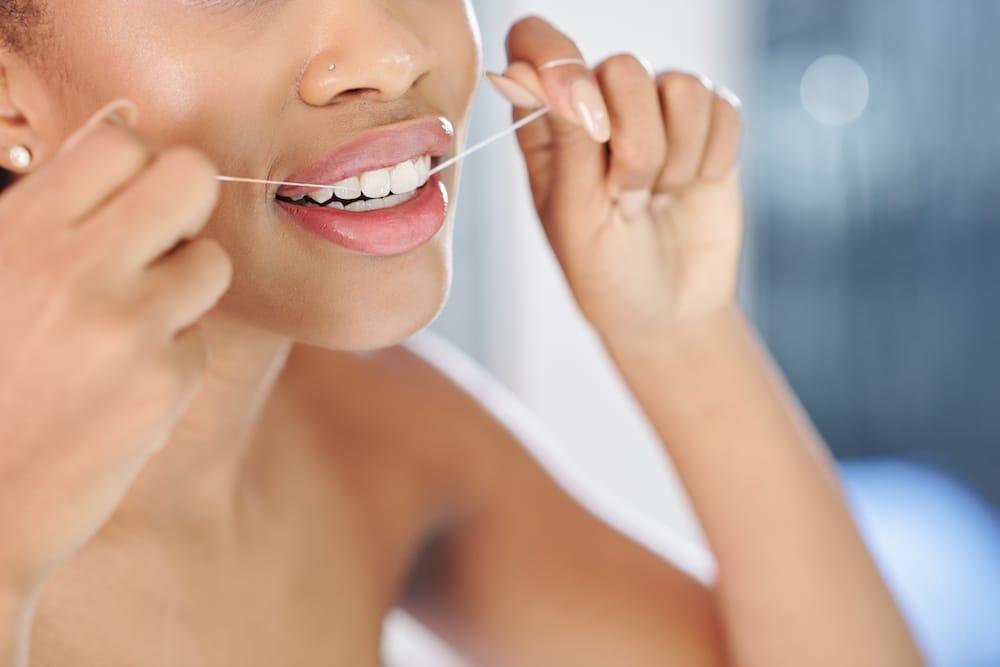 Should You Floss Before or After Brushing? Kherani