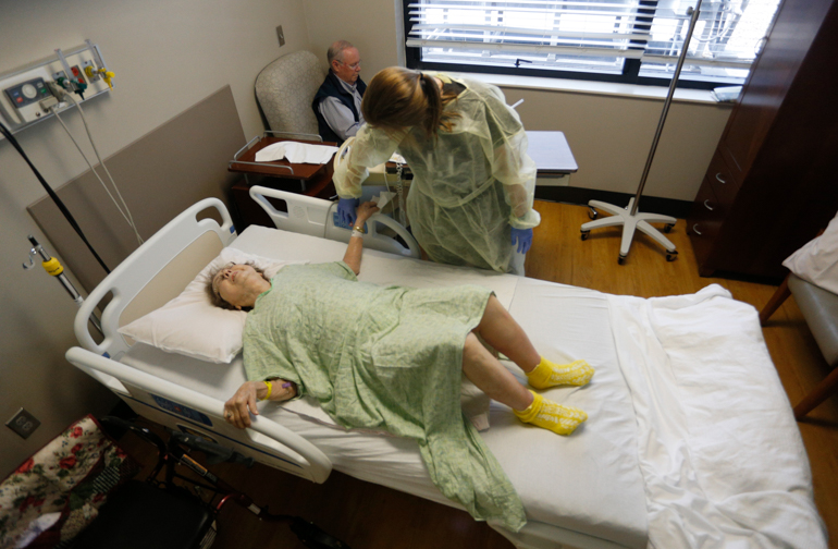 People In Hospital Beds