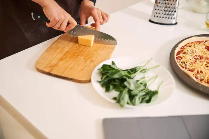 Does Cutting Cheese Dull Knives? KnifeVerge