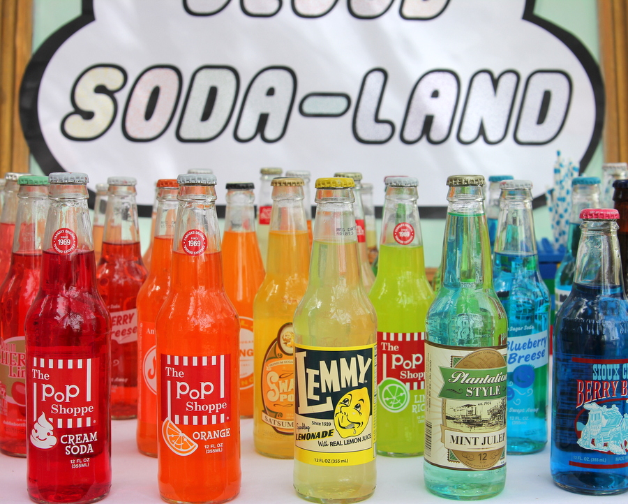 a rainbow of soda bottles