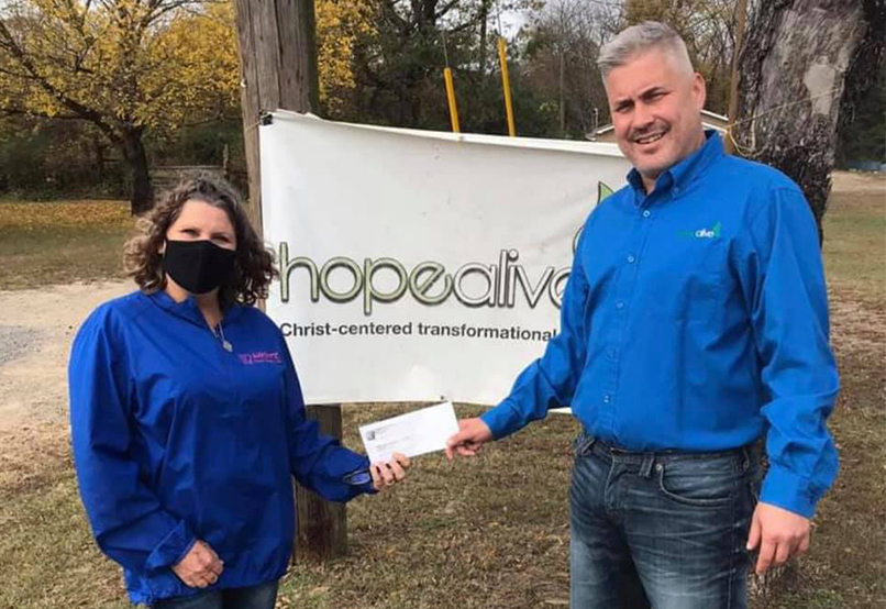 Shelli Crowell with Koontz Electric delivers a donation and took a tour