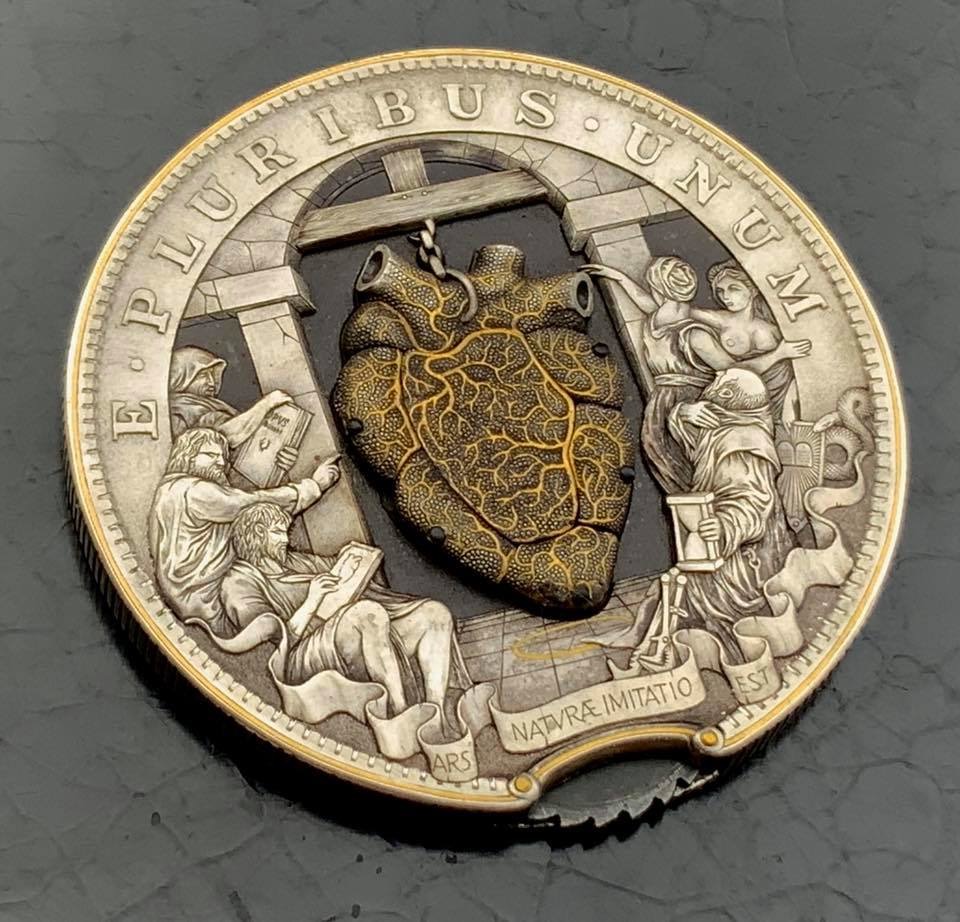 HandEngraved Coin with a Beating Heart
