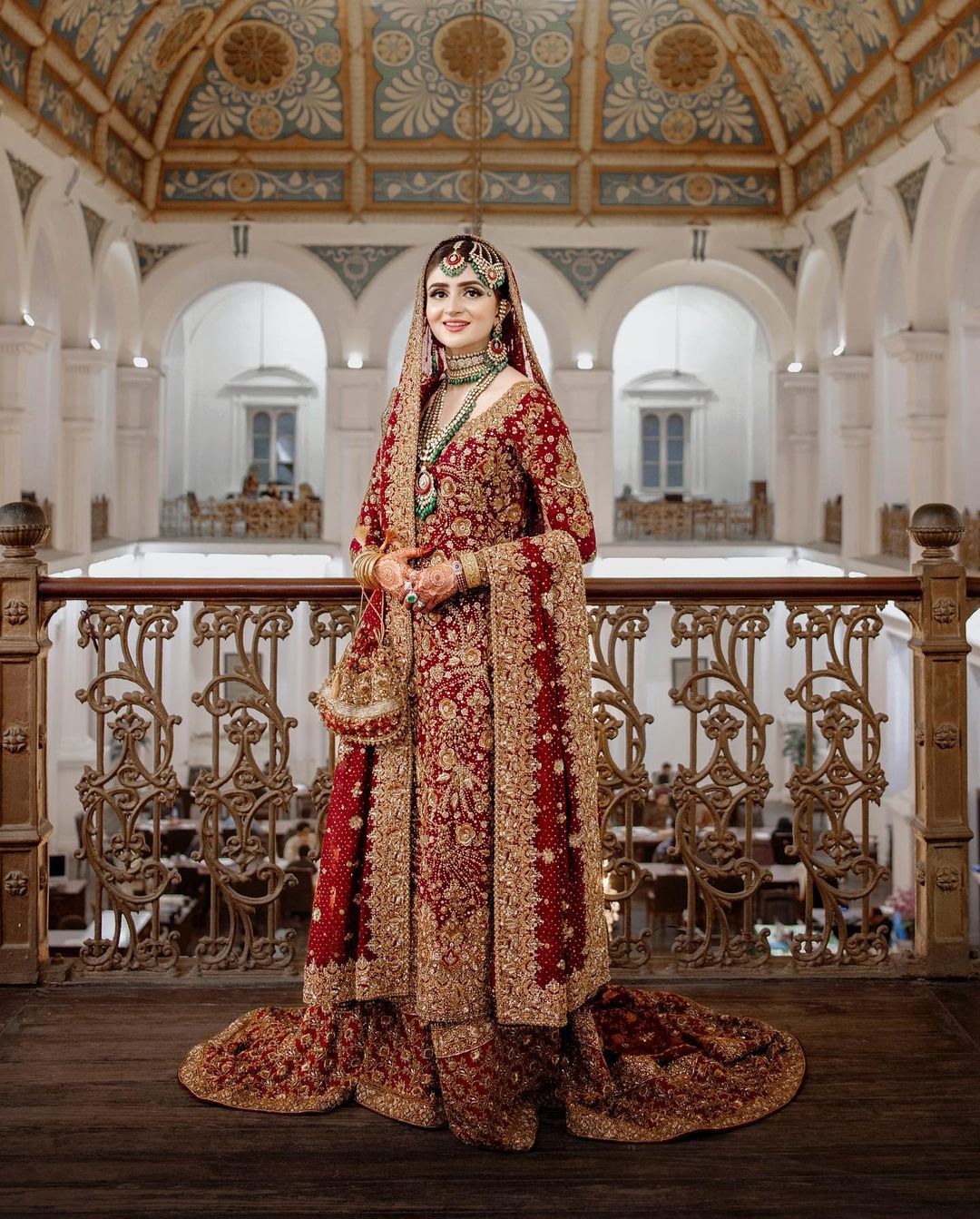 Red Embroidered Pakistani Wedding Kurti with Long Trail Lehenga