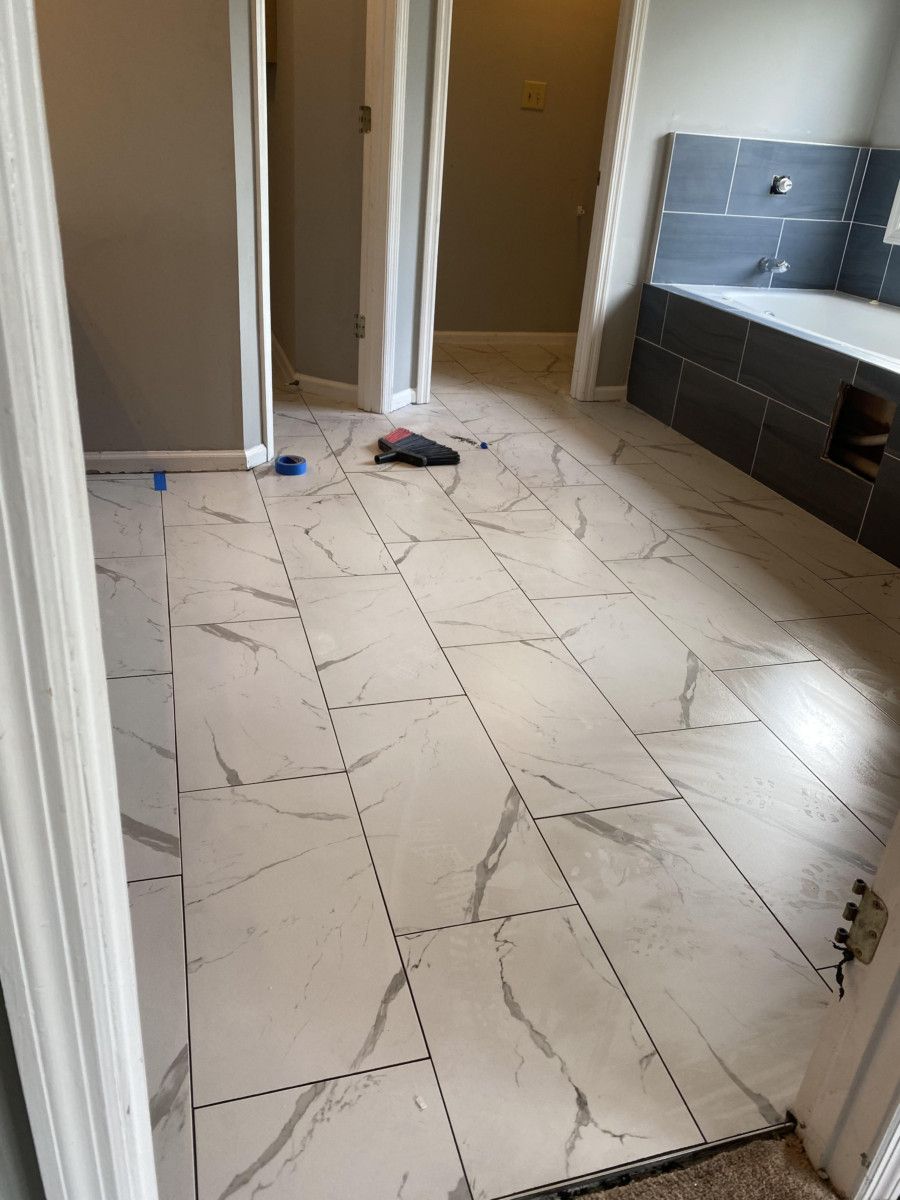 Bathroom Remodel marble/soft black Kentucky Tile Closeouts