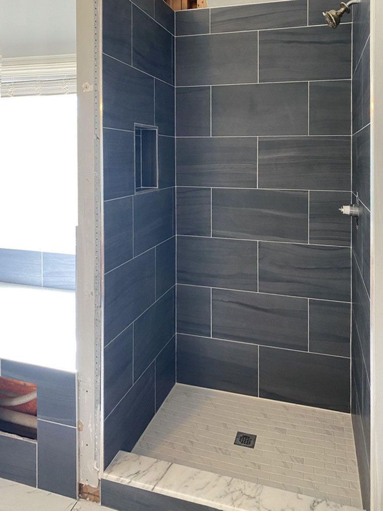 Bathroom Remodel marble/soft black Kentucky Tile Closeouts
