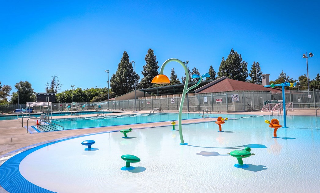 La County Pools SWIM PLAY COMPETE