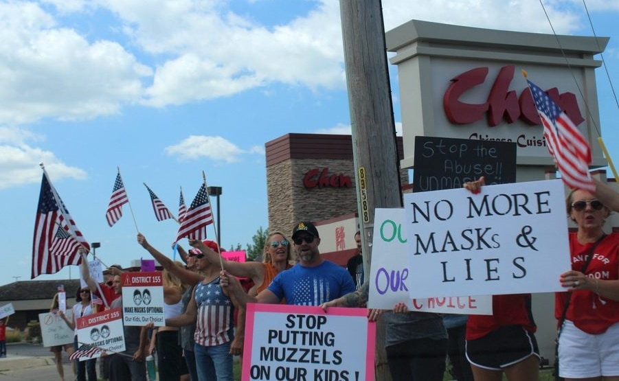 Demonstrators gather in Crystal Lake to protest Illinois' school mask