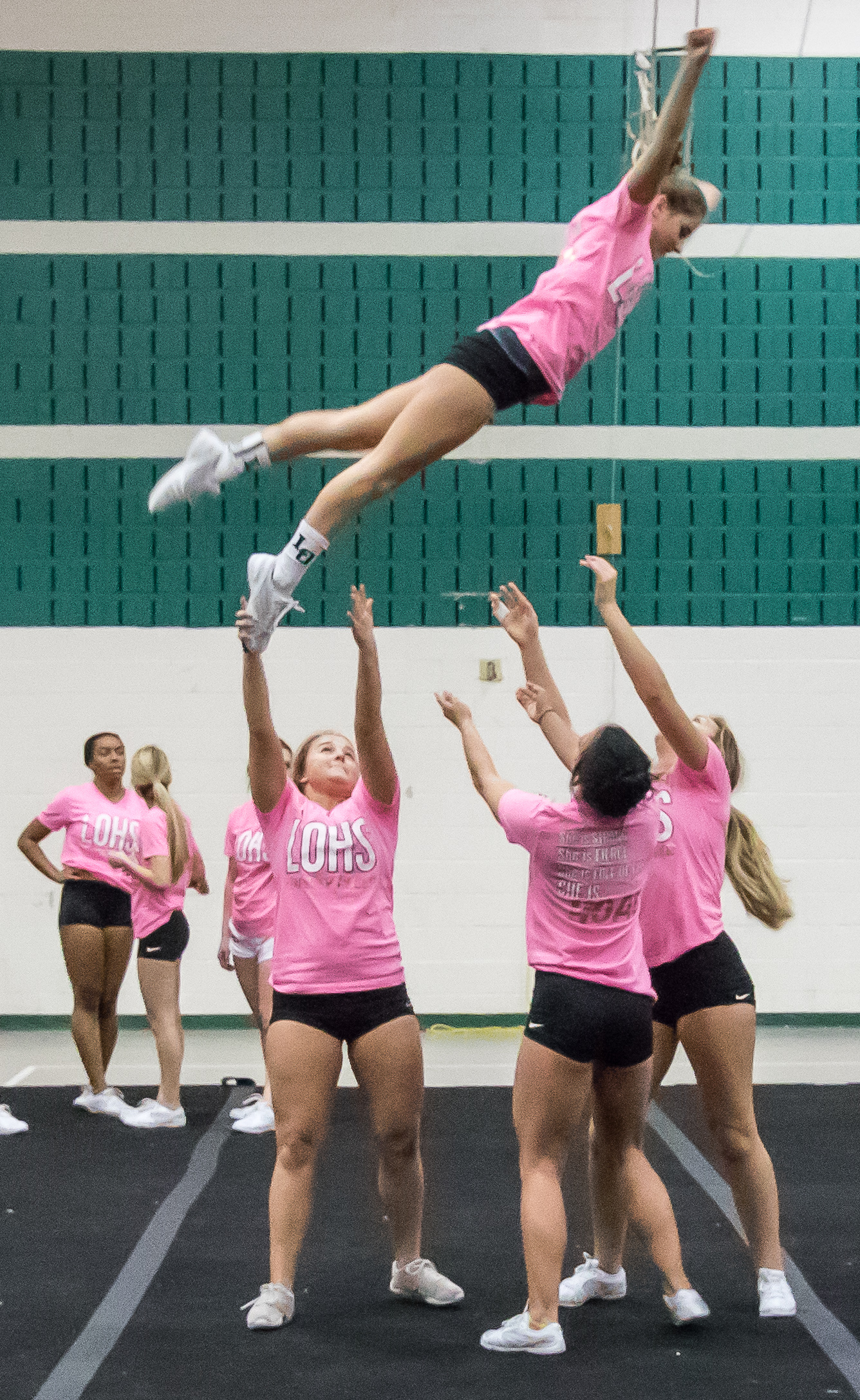 Lake Orion competitive cheer team is athletic and intense Lake Orion
