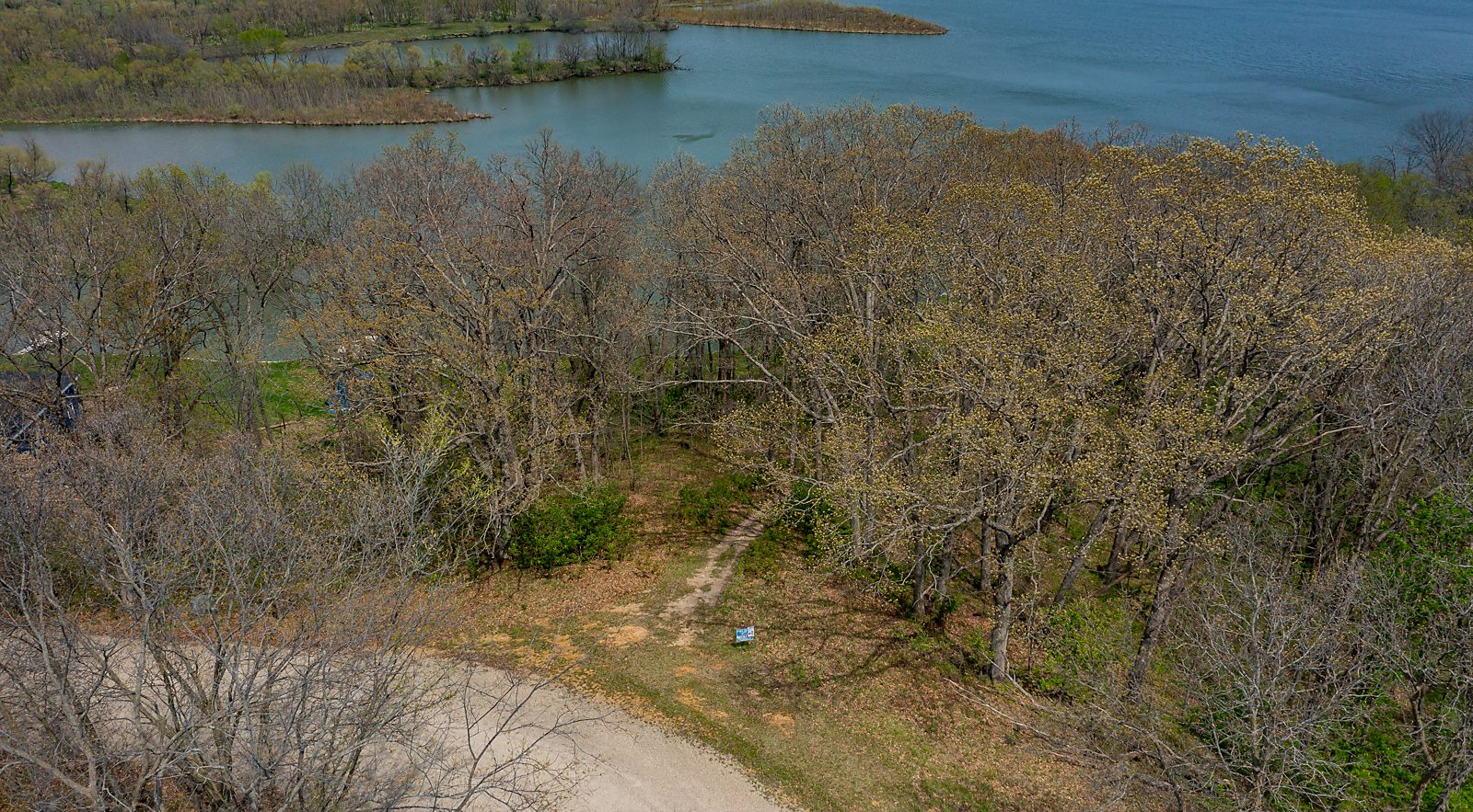 Wooded Iowa Lake Front Property for Sale! Lake Homes and Farms Realty