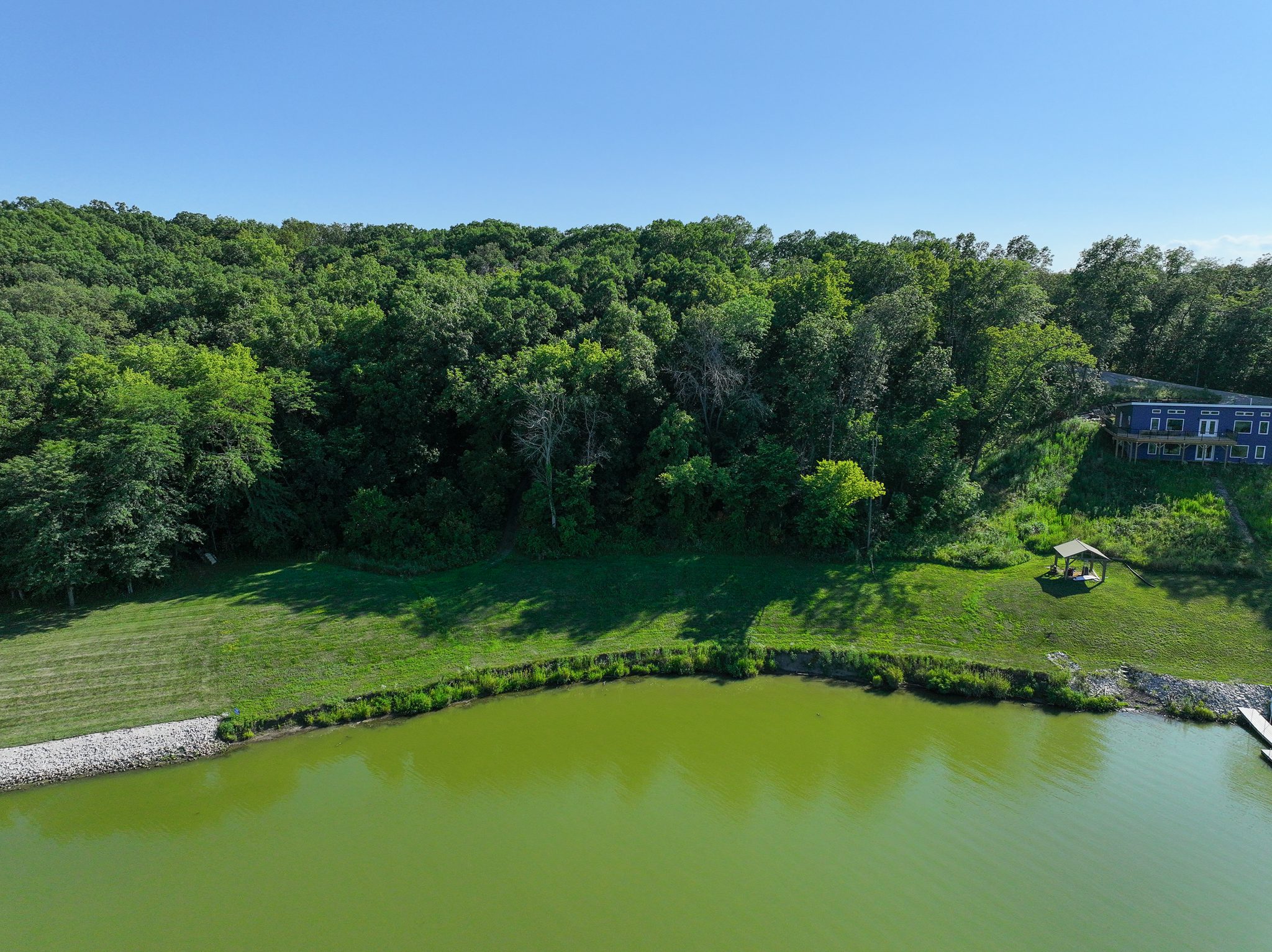 Wooded Iowa Lake Front Property for Sale! Lake Homes and Farms Realty