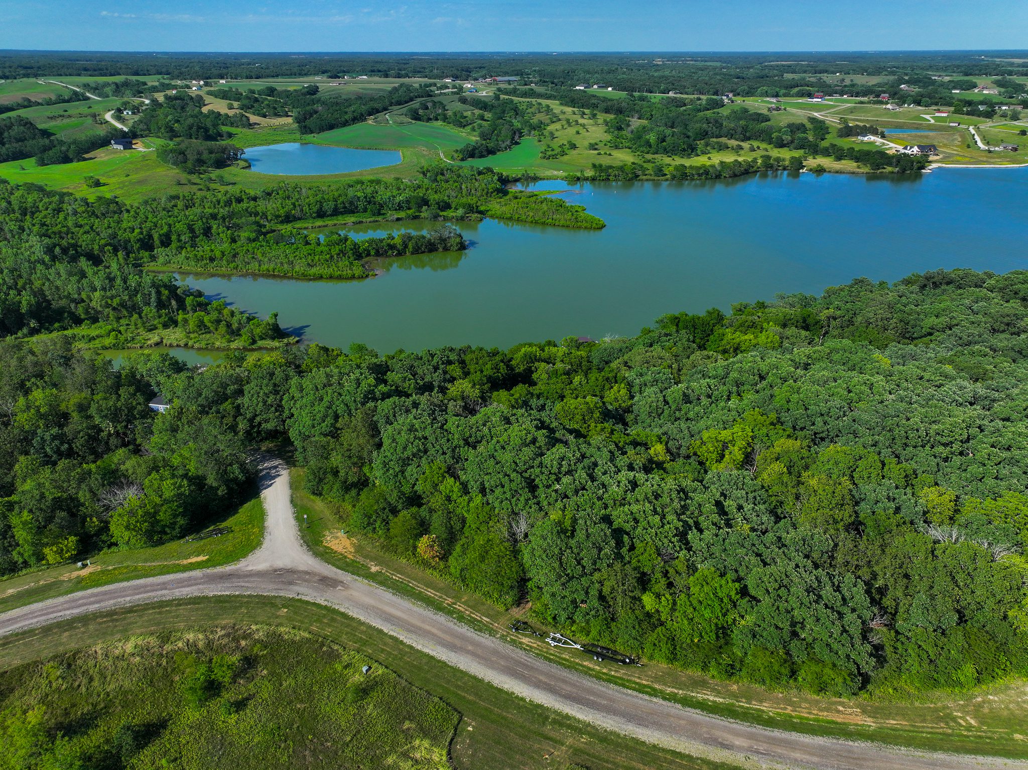 Wooded Iowa Lake Front Property for Sale! Lake Homes and Farms Realty