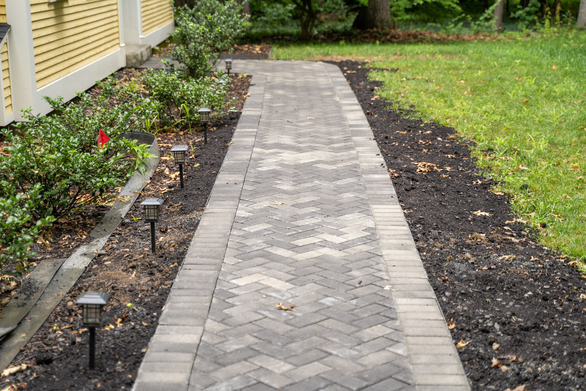 Natural Stone vs. Pavers Lamacchia Landscape Construction
