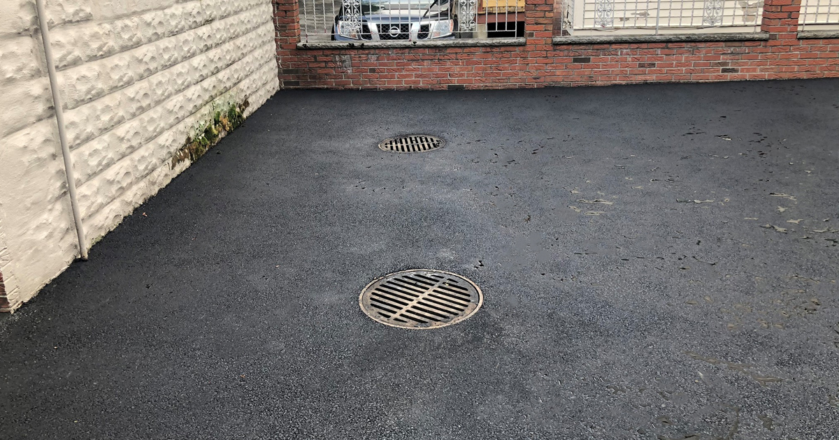 How to Improve Drainage in Your Driveway Lamacchia Landscape Construction