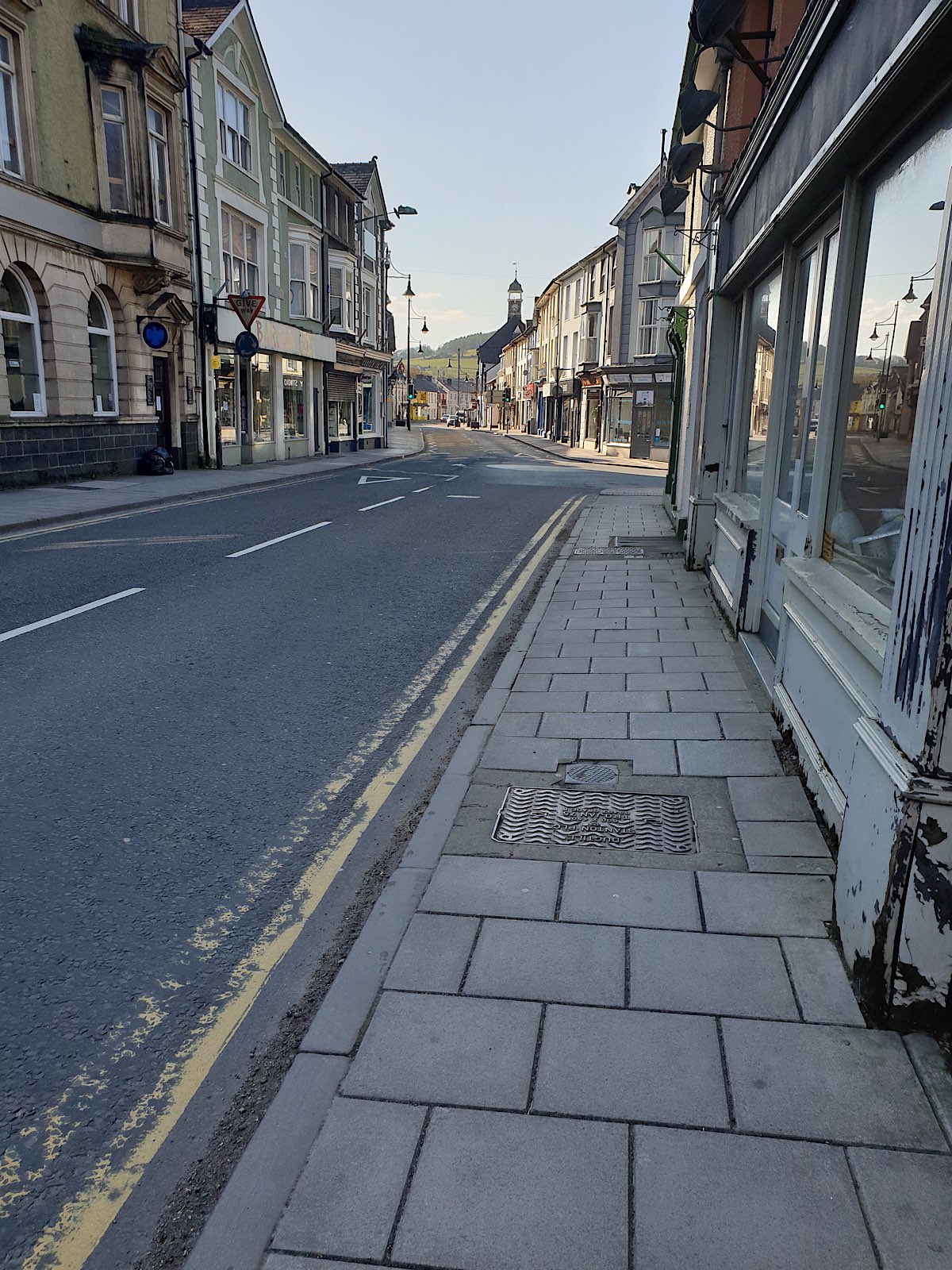Empty Lampeter, looking from Bridge Street up towards the High Street, no-one to be seen.