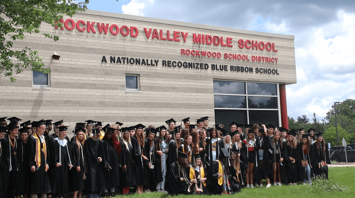 Seniors celebrate graduation by walking through previous schools The