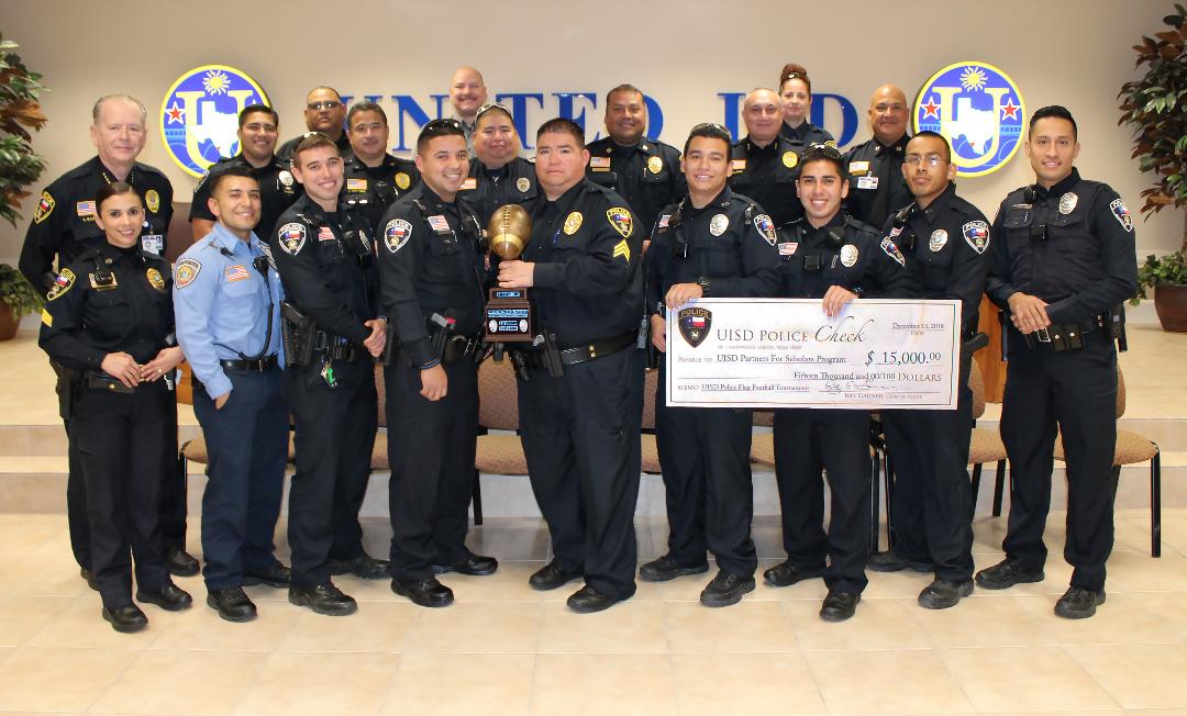 UISD Police Presents Football Tournament Profits to District’s Partner