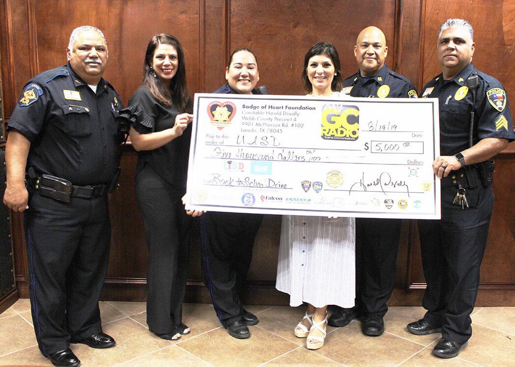 Constable Harold Devally and Guerra Communications Donate 10,000.00 to