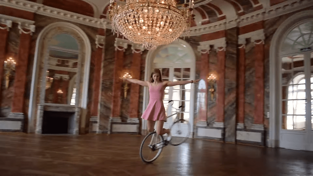 Woman Performs Graceful Ballet Routine With a Bicycle