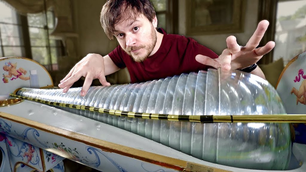 Musician Rob Scallon Learns How to Play a Motorized Spinning Glass Bowl