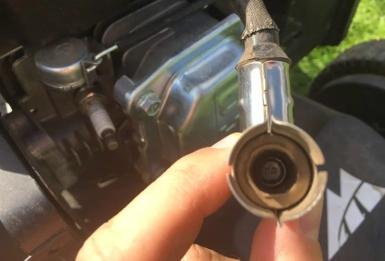How to Tell If a Lawn Mower Spark Plug is Bad? (4 Signs)
