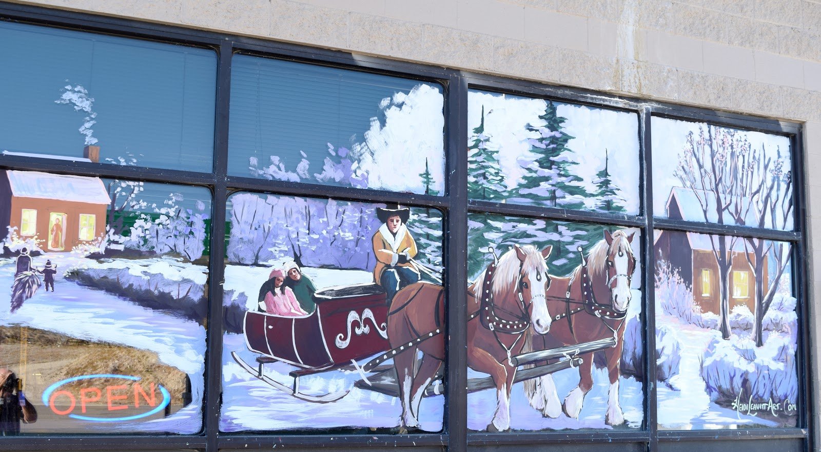 Holiday Window Paintings Brighten up Alamo Businesses