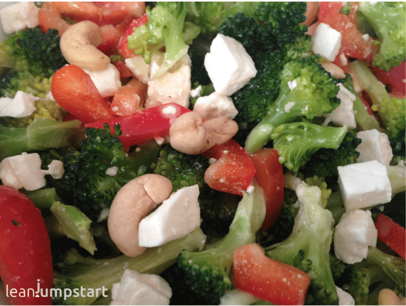 Raw broccoli cashew salad with red peppers a fiberrich vitamin bomb