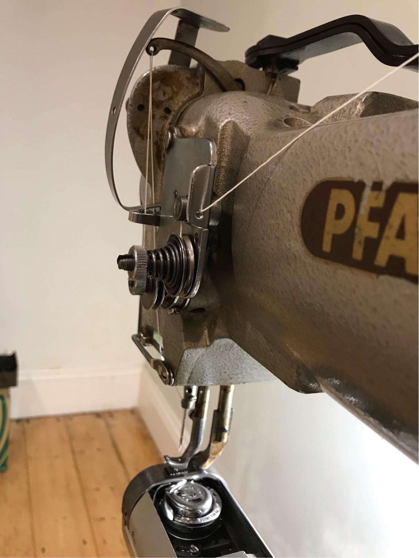 Thread stuck to bobbin when pull out the work Leather Sewing Machines