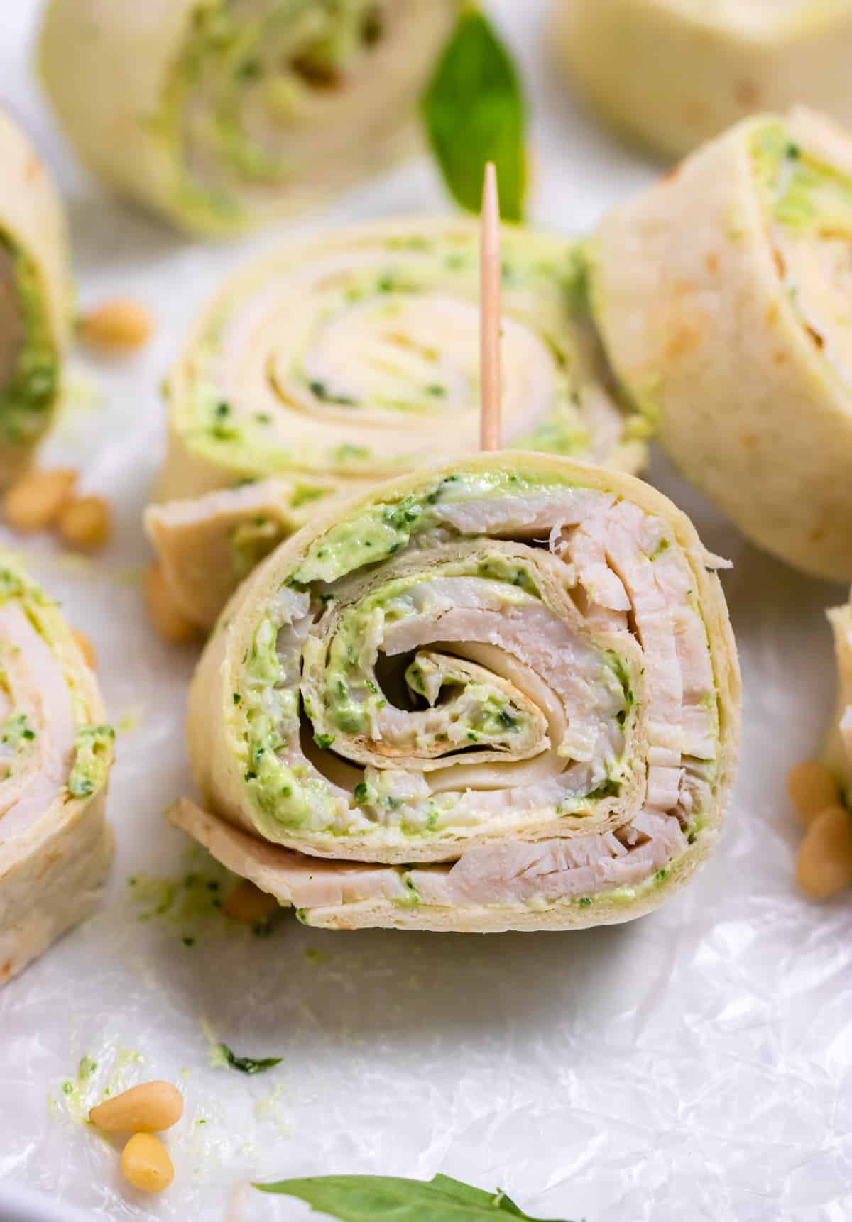 Turkey Pesto Pinwheels with Smoked Provolone Lemons + Zest