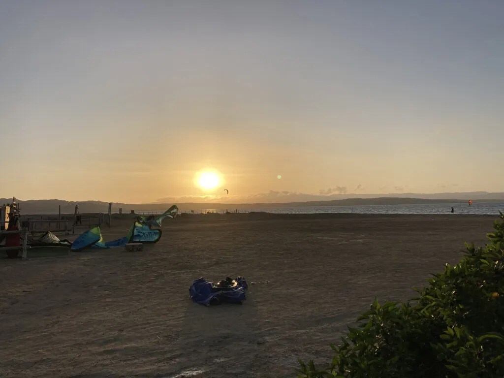 Almost sunset Paracas kite spot Peru, Paracas - small town resort with kitesurfing in the background.