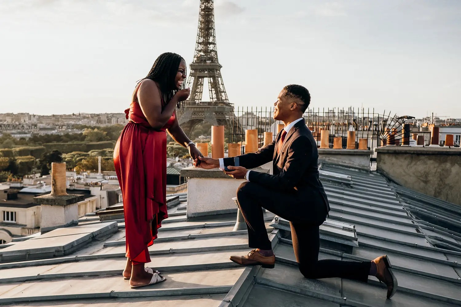 A Romantic Paris Rooftop Proposal Let's Run To The Sun