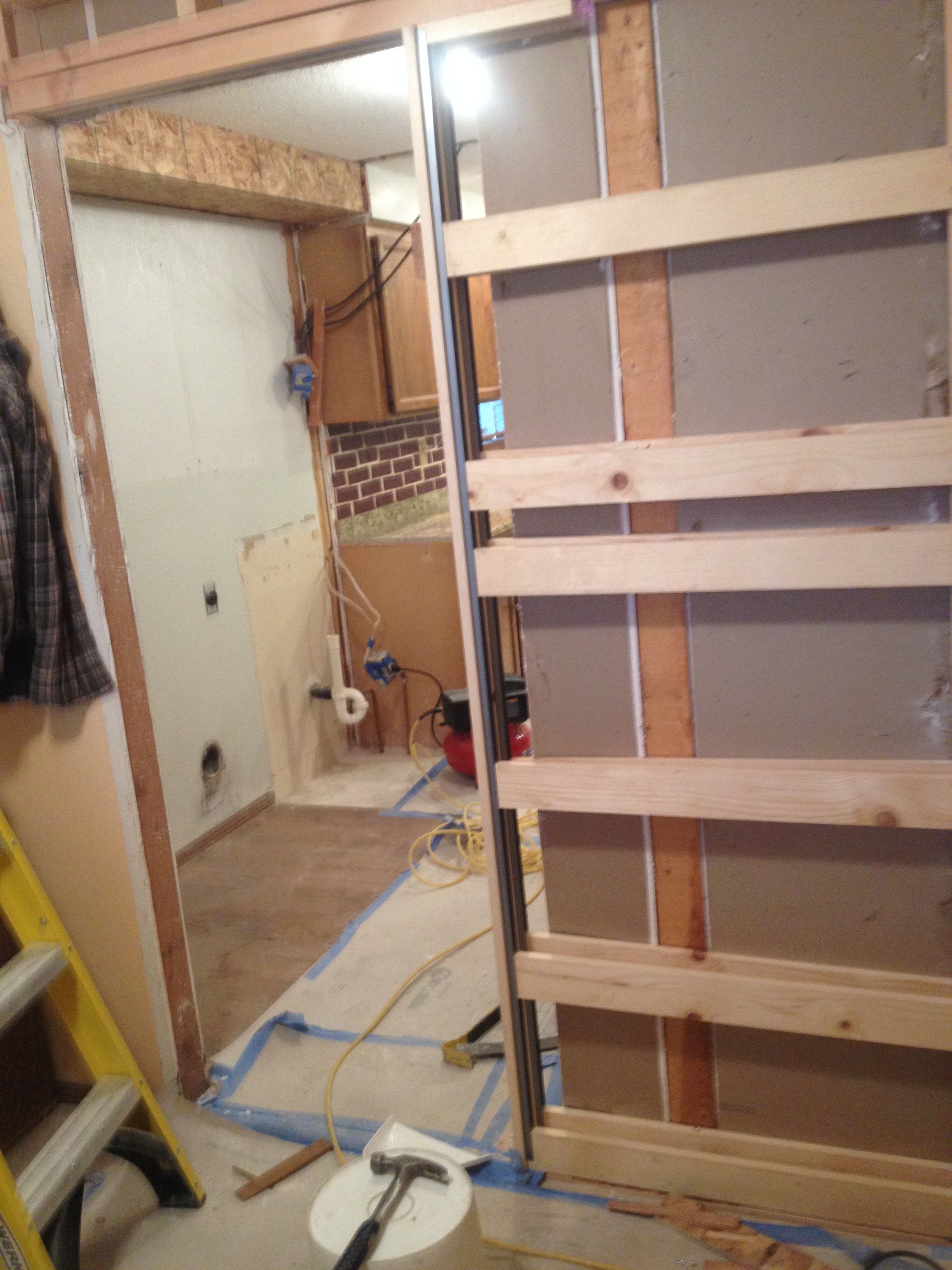 Installing the pocket door Home Remodeling Boise, Idaho