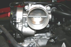 How to Install an Airaid Poweraid Throttle Body Spacer on Your 2011