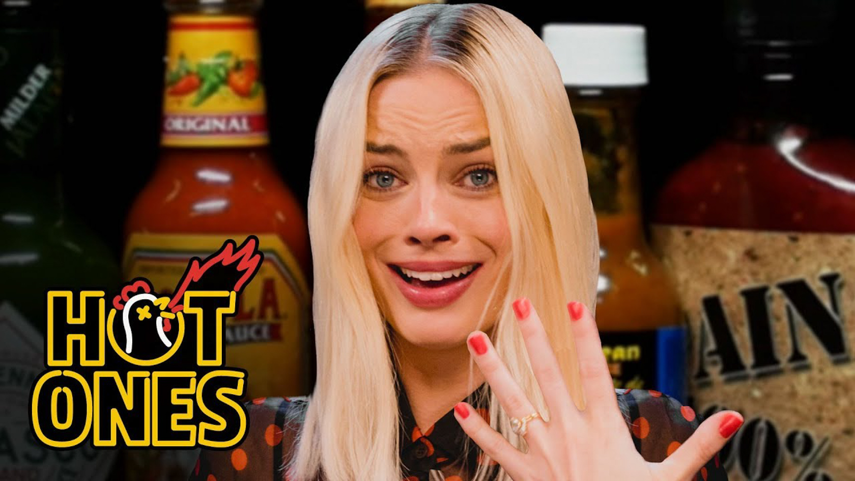 Watch Margot Robbie Almost Dies In New 'Hot Ones' Episode