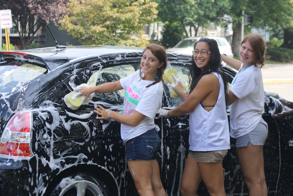 Cheer squads hold car wash to raise funds Herald Community Newspapers