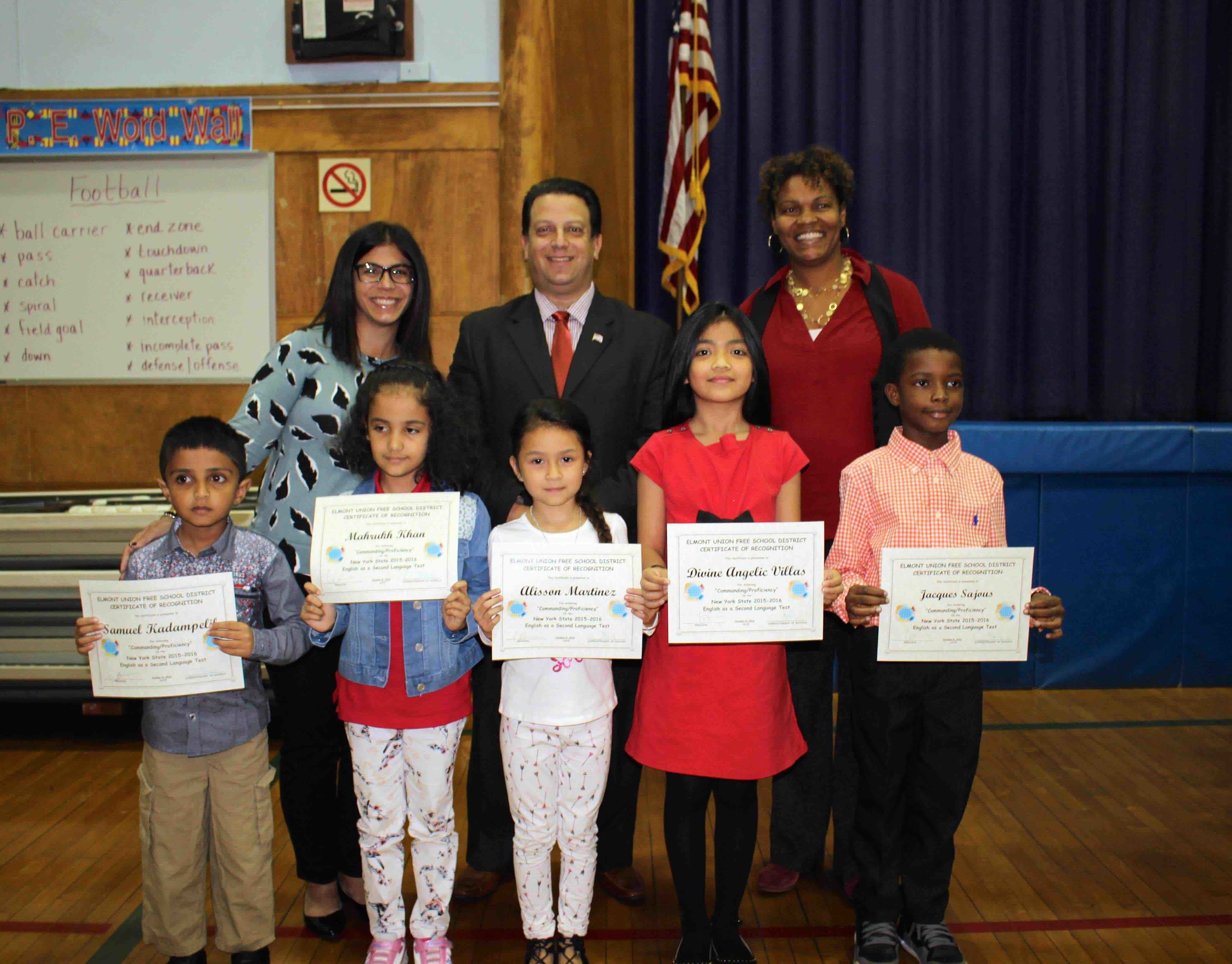 Student and board member recognition in Elmont Herald Community