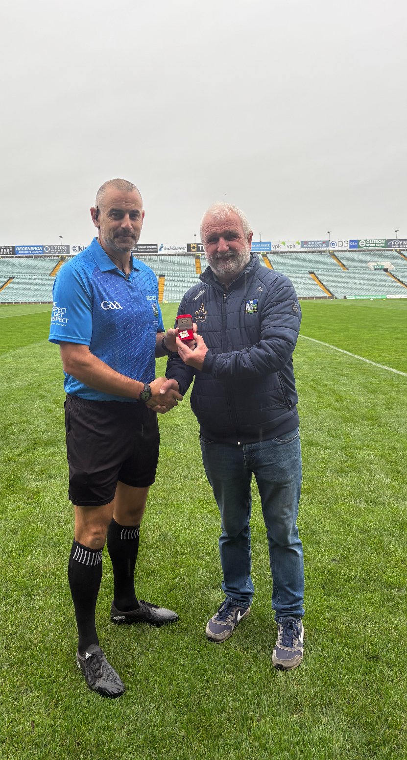 Limerick PRO Éamonn Phelan presenting Referee Éamonn Stapleton with his