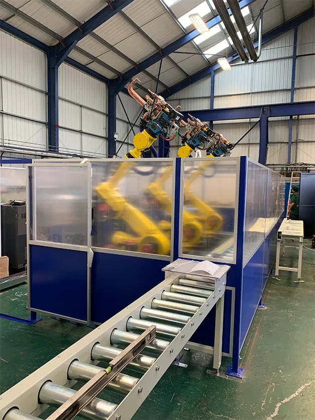 3 system spot welding cell conveyor driven which is welding industrial