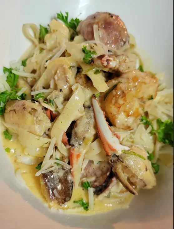 Cajun Crab Finger, Shrimp, Andouille Sausage Pasta w/Whiskey Cream Sauce