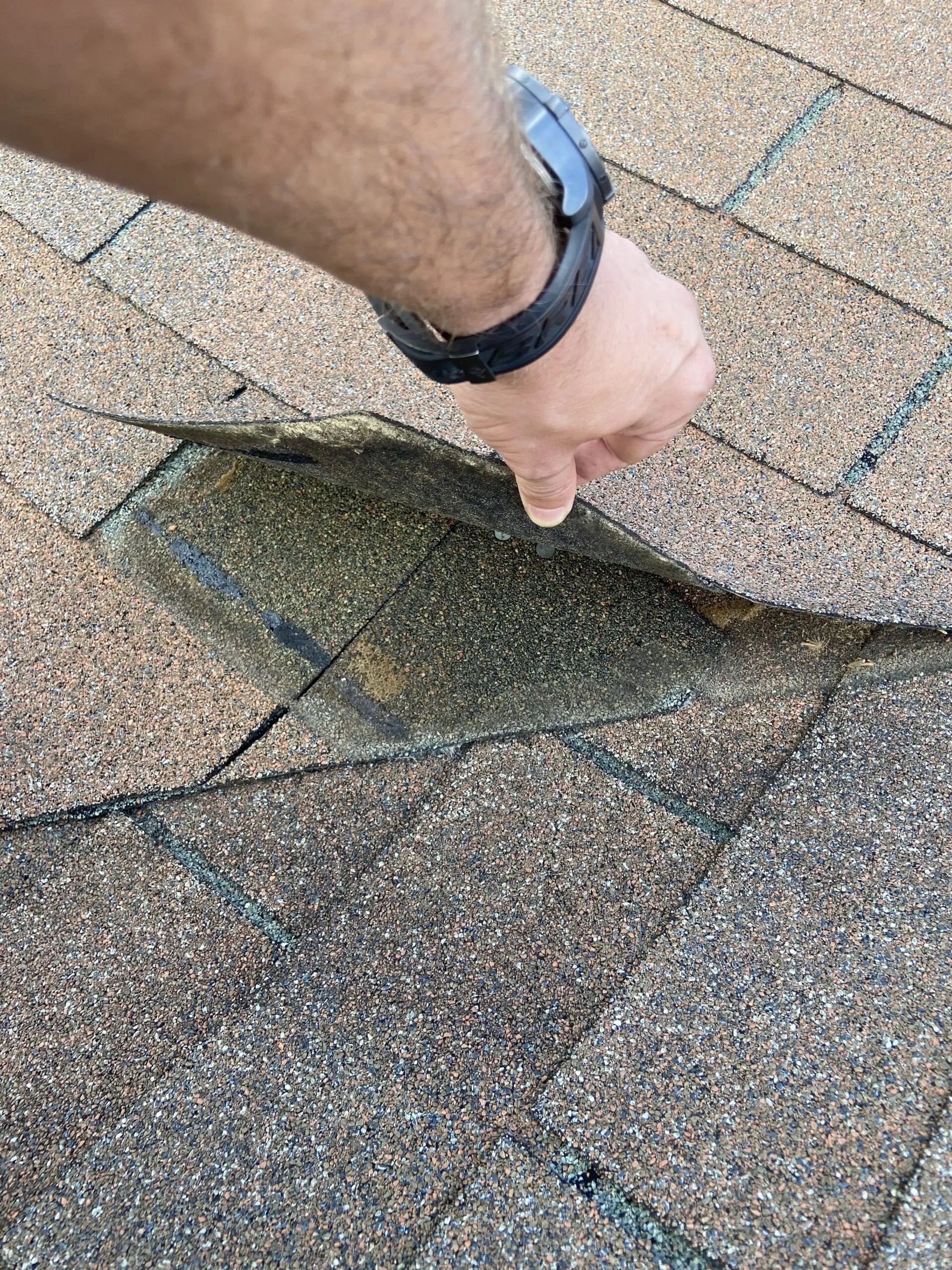 Knoxville Roofing Company Inspects a Roof Leak to Determine if the Roof