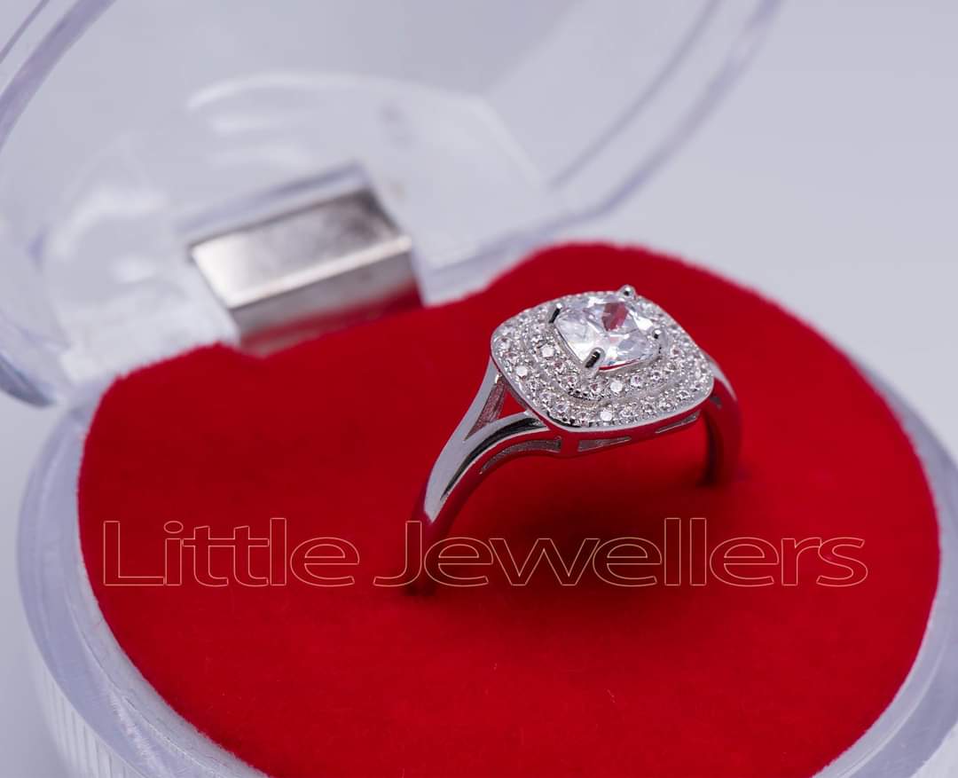 How Much Should You Spend on an Engagement or Wedding Ring? Little