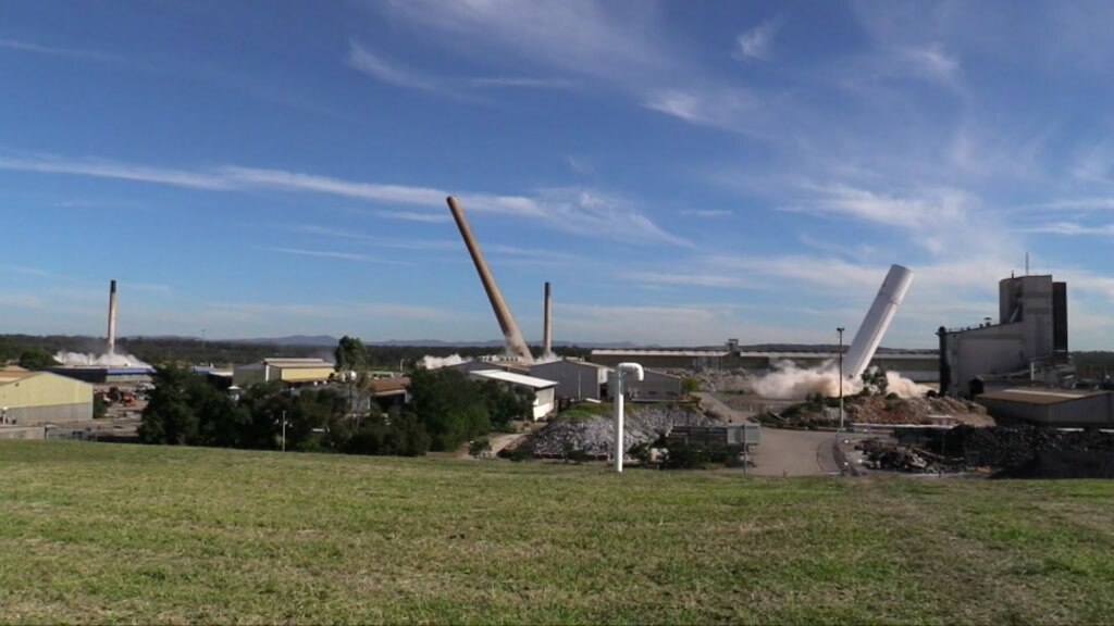 Kurri Kurri smoke stacks come crashing down in explosive demolition