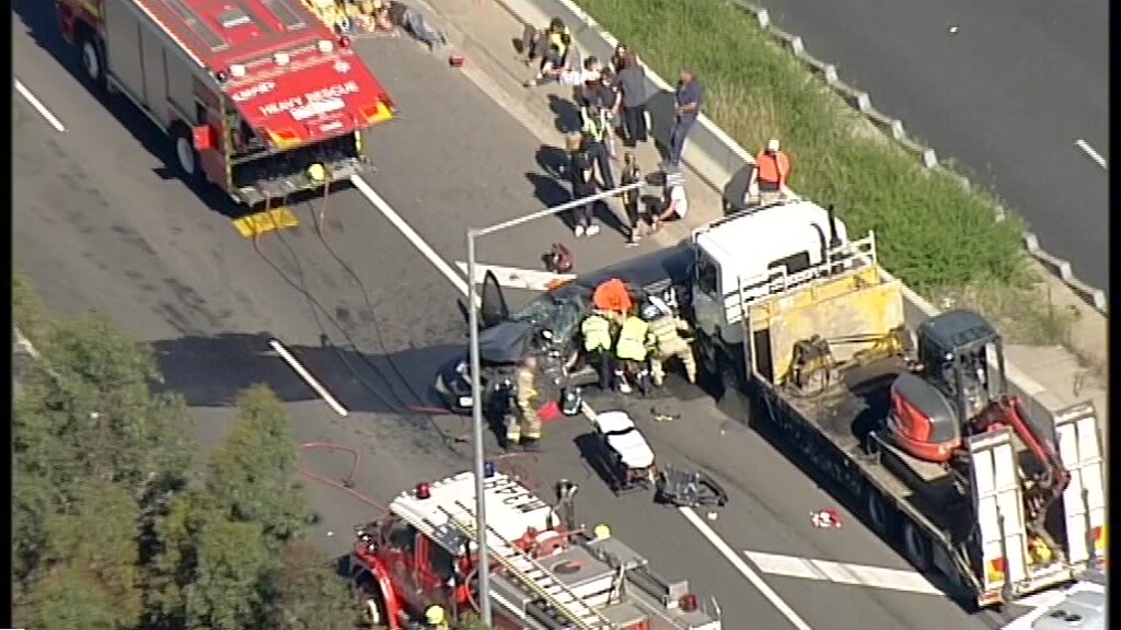 Eight injured in multicar crash involving truck on Melbourne's Ring
