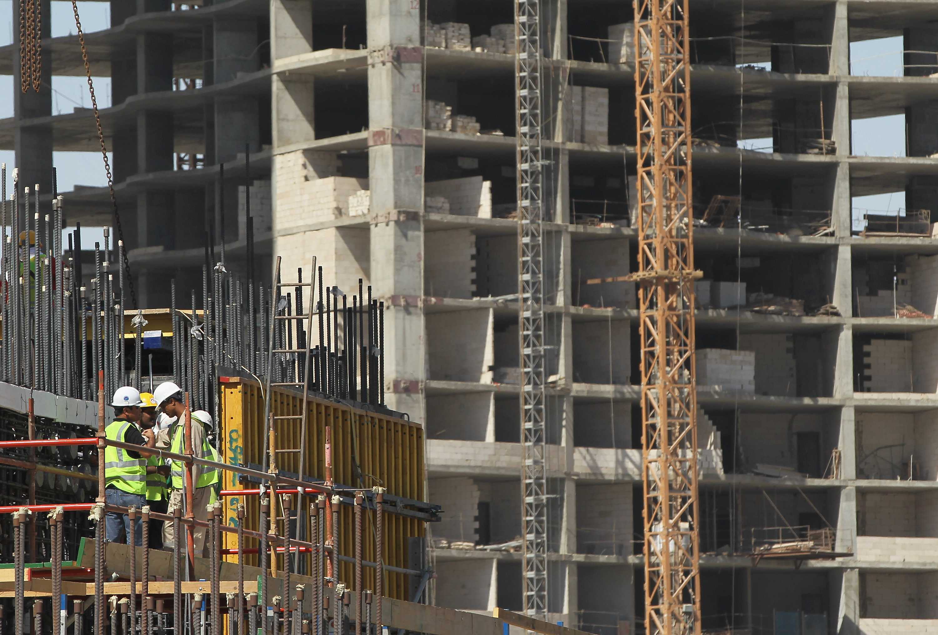 Migrant workers dying after being treated as 'modern slaves' by Qatar