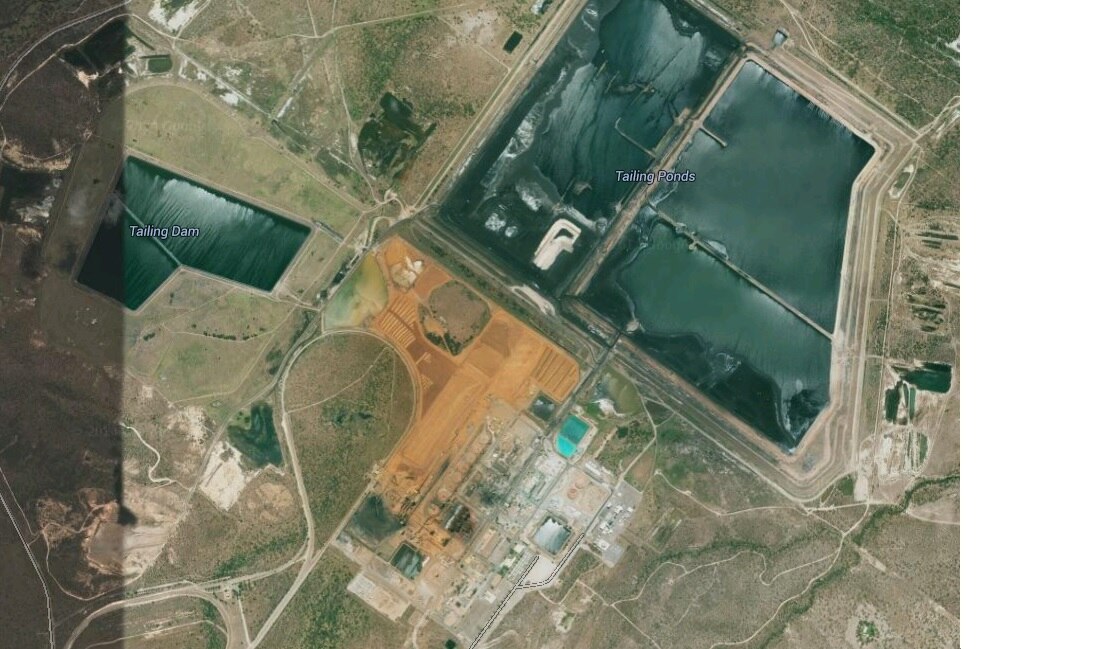 Clive Palmer denies putting business interests ahead of Queensland