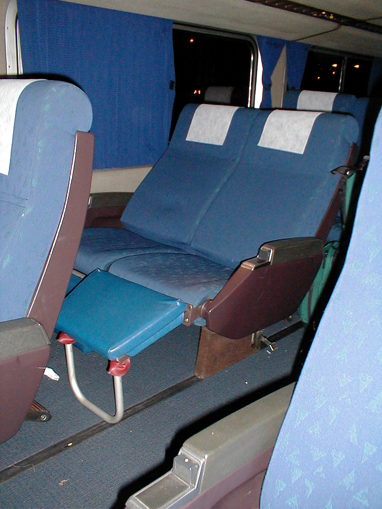 Coach Seats Coach seats recline for sleeping, but not quit… Flickr