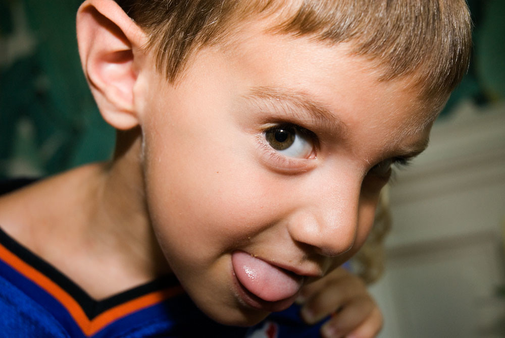 Little boy making funny face Little boy making a funny fac… Flickr