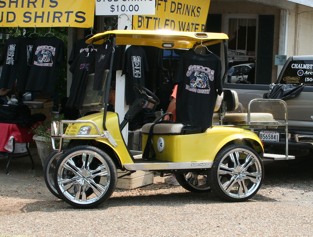 Chrome wheels on a golf cart! Took me by surprise. I've ne… Flickr