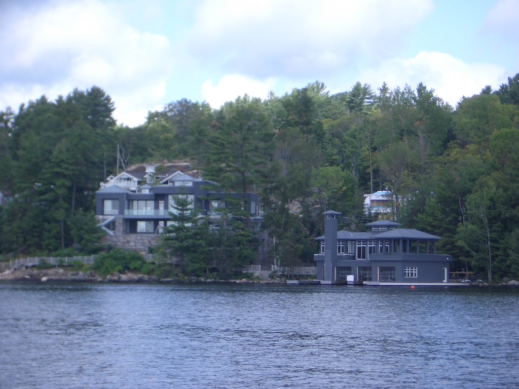 modern lake house near Muskoka, Canada. with a fancy boat … Flickr